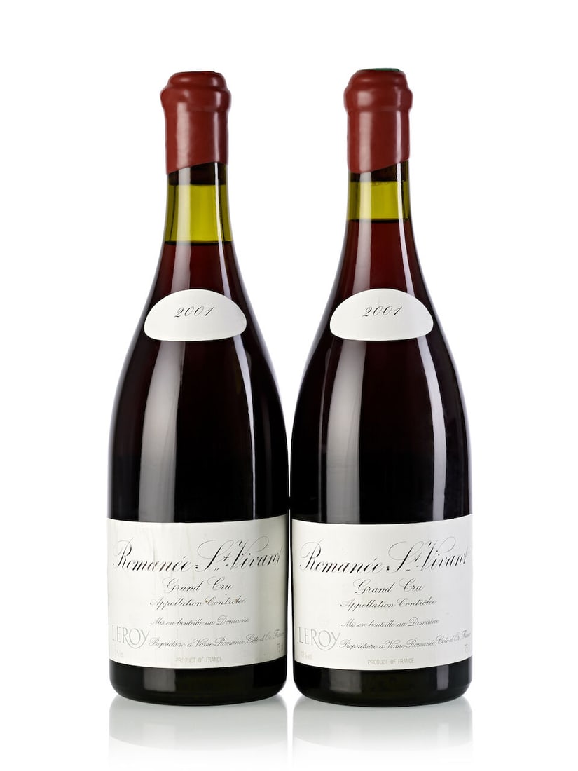 Domaine Leroy Romanée St. Vivant, 2001 (2x 750ml): Domaine Leroy Romanée St. Vivant, 2001 (2x 750ml) Region: Burgundy Fill Level: 1x 2cm, 1x 3cm Cork: 1x signs of old seepage Label: 2x scuffed front & back labels Miscellaneous: Production: 2371