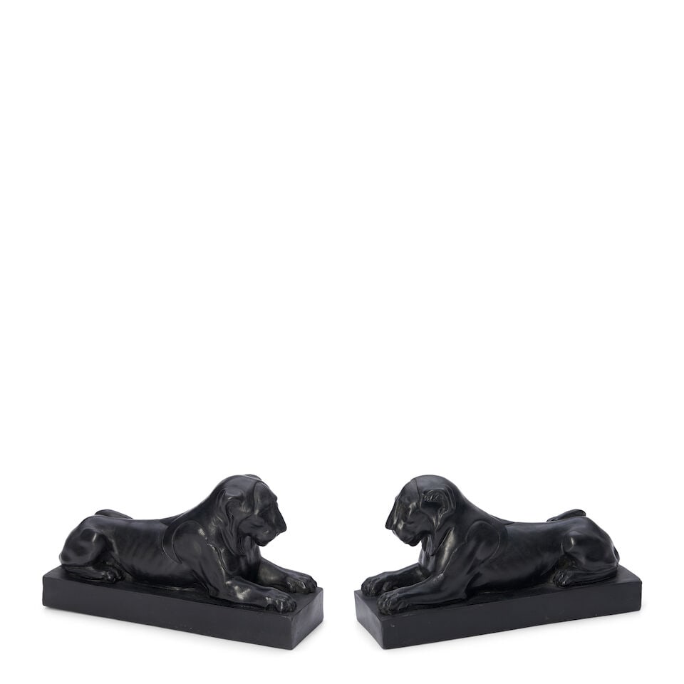 Pair of Wedgwood Black Basalt Lions Couchant, England, late 18th century,: Pair of Wedgwood Black Basalt Lions Couchant, England, late 18th century, set atop a raised rectangular base, impressed marks, ht. 4 1/4 in. Footnotes: Literature: Illustrated in Robin Reilly's two