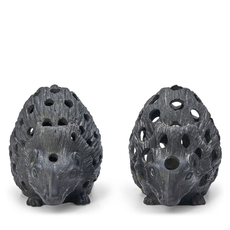 Two Wedgwood Black Basalt Hedgehogs, England, 19th century,: Two Wedgwood Black Basalt Hedgehogs, England, 19th century, each realistically modeled and with numerous holes for crocus, impressed marks, ht. 6 1/4, 6 1/2 in. For further information on this lot