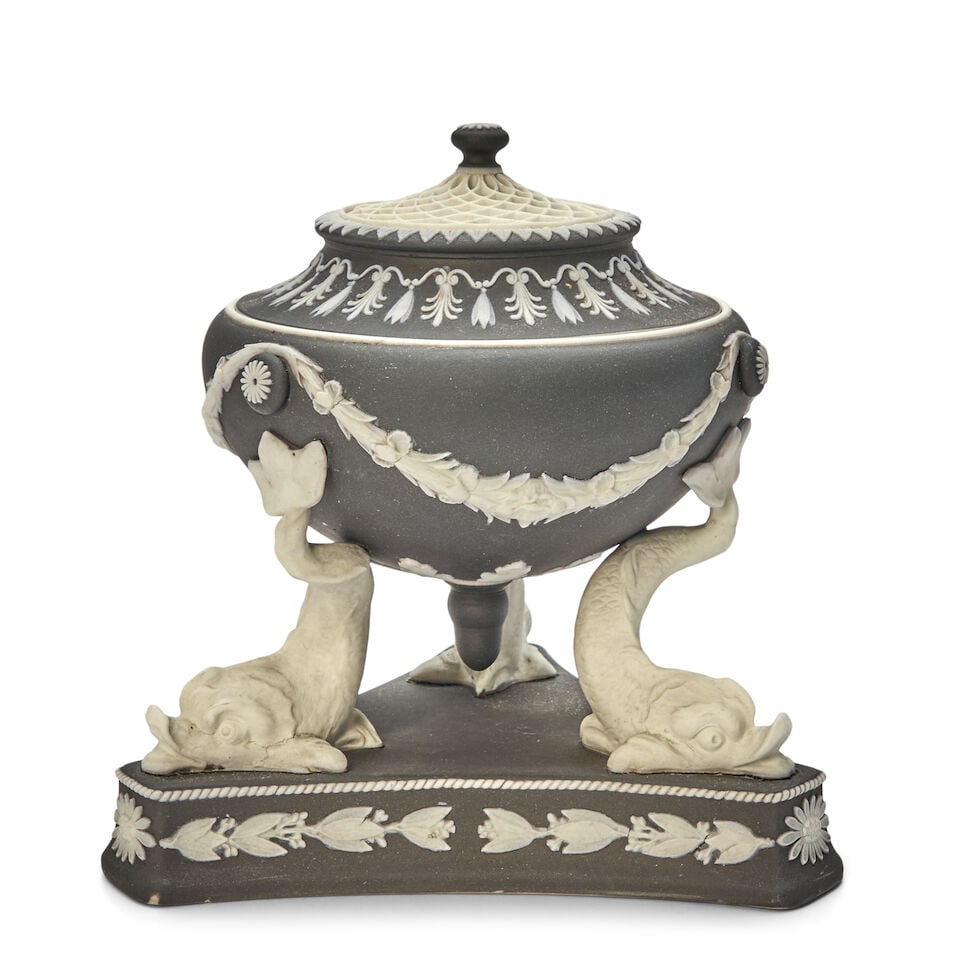 Wedgwood Black Jasper Dip Incense Burner, England, late 19th century,: Wedgwood Black Jasper Dip Incense Burner, England, late 19th century, reticulated cover with applied white foliate relief border atop a bowl with foliate swags, all supported to the tails of three dol