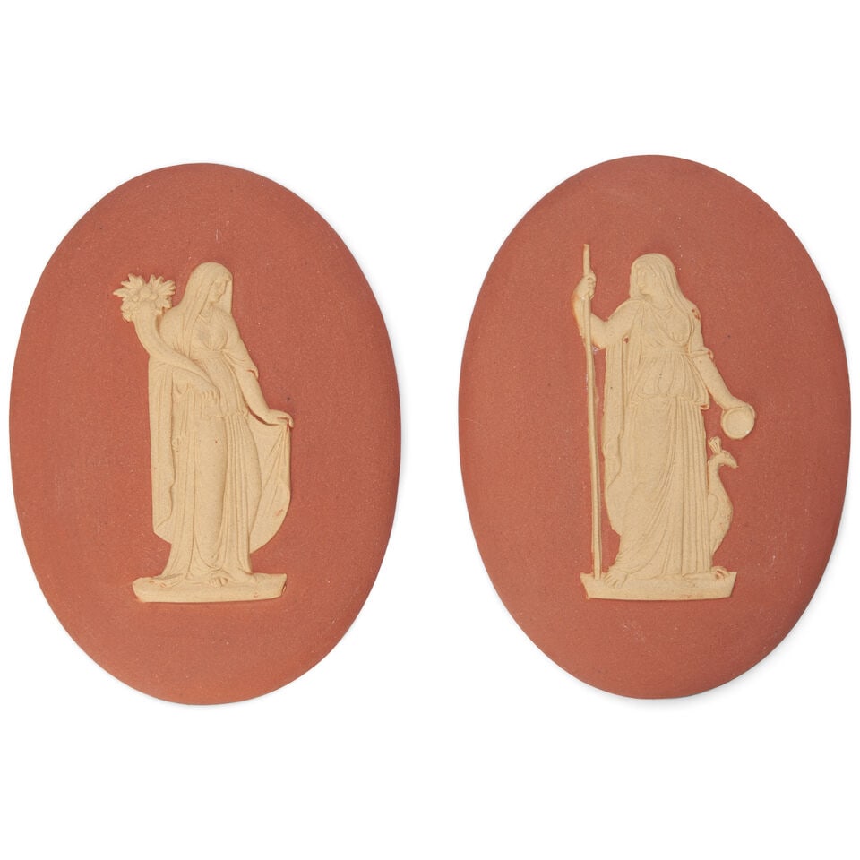 Pair of Wedgwood Rosso Antico Medallions, England, early 19th century,: Pair of Wedgwood Rosso Antico Medallions, England, early 19th century, oval shape with applied cane classical maidens in relief, impressed mark, lg. 3 7/8 in. For further information on this lot