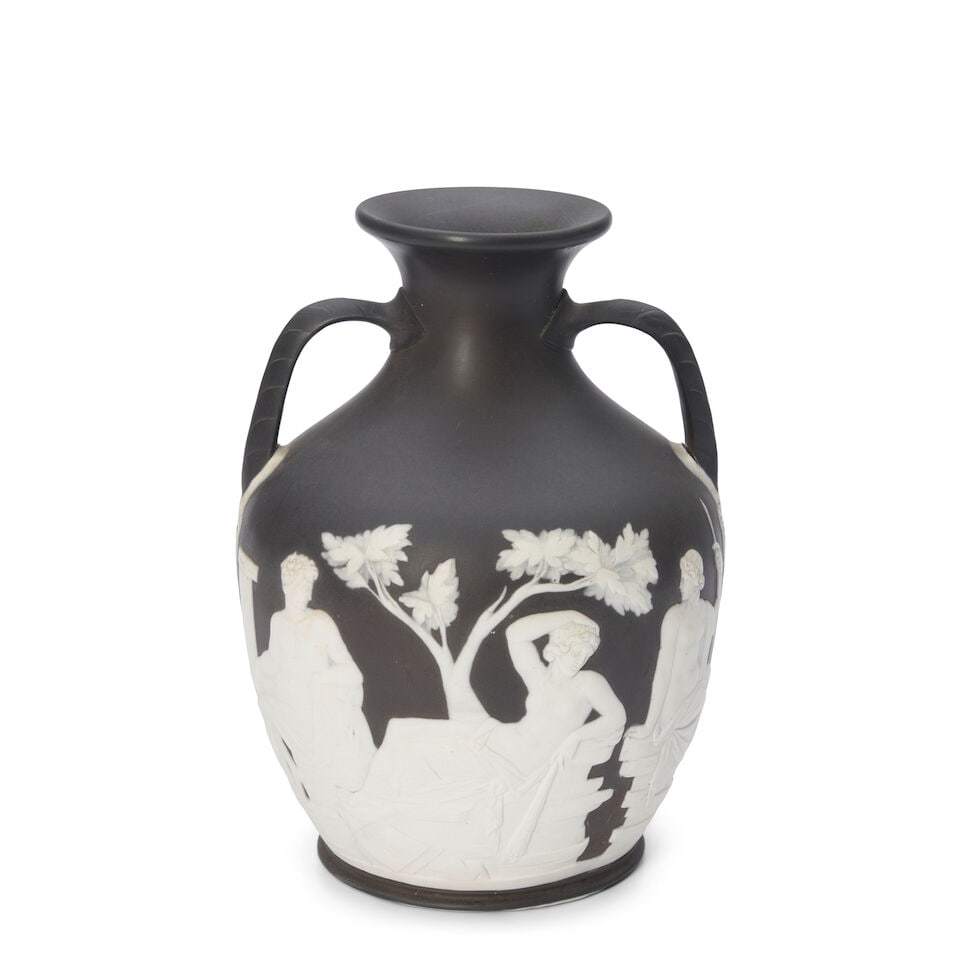 Wedgwood Solid Black Jasper Portland Vase, England, 19th century,: Wedgwood Solid Black Jasper Portland Vase, England, 19th century, applied white classical figures in relief, a man wearing a Phrygian cap below the base, impressed mark, ht. 11 1/2 in. For further