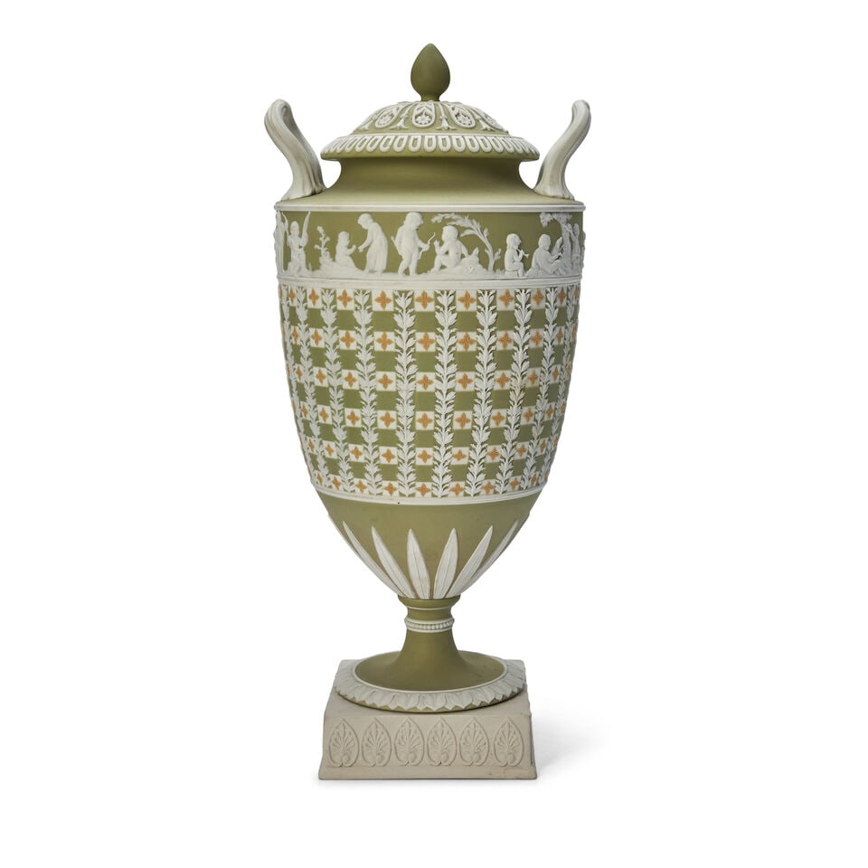 Wedgwood Tricolor Jasper Dip Diceware Vase and Cover, England, 19th century,: Wedgwood Tricolor Jasper Dip Diceware Vase and Cover, England, 19th century, green ground with yellow quatrefoils and applied white classical band of children at the shoulder, allover white jasper pli