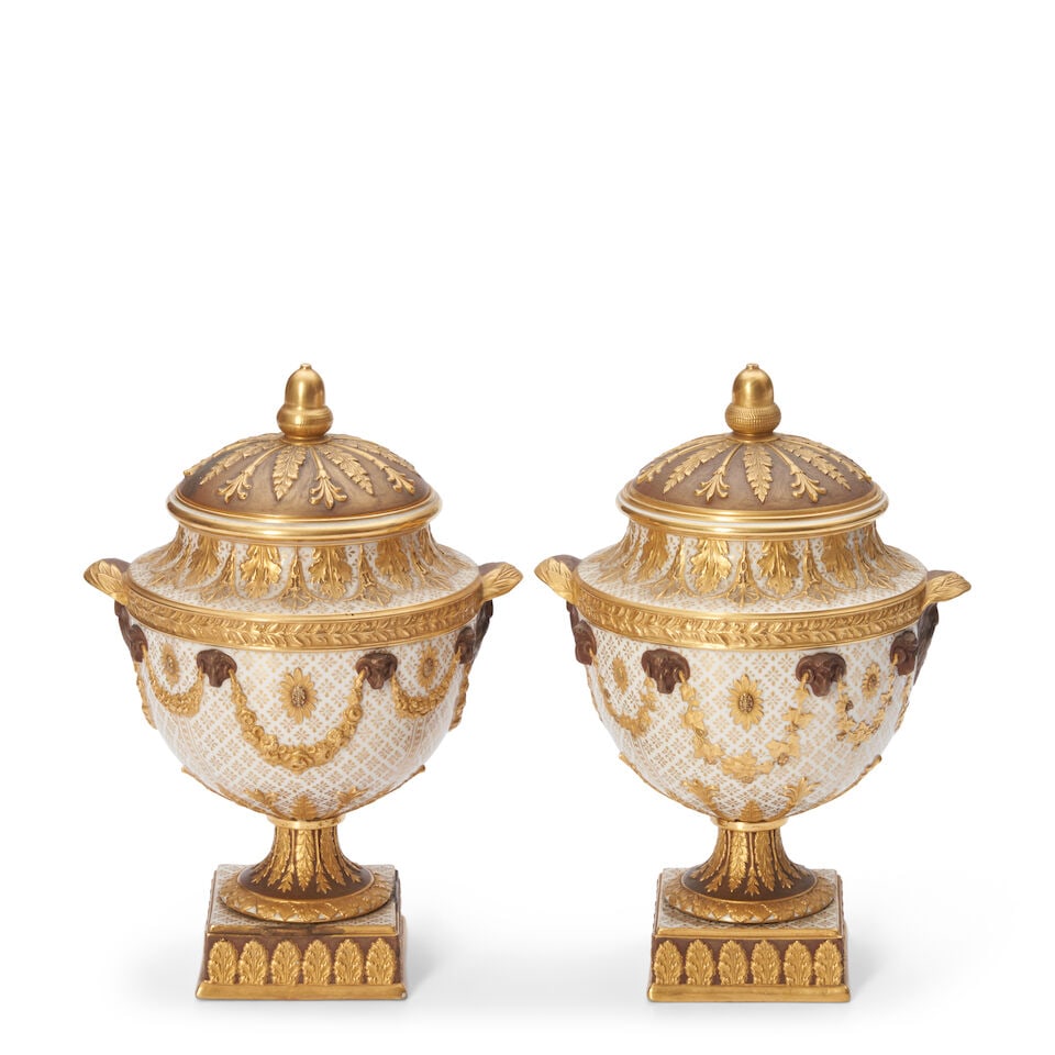 Pair of Wedgwood Gilded and Bronzed Queen's Ware Vases and Covers, England, late 19th century,: Pair of Wedgwood Gilded and Bronzed Queen's Ware Vases and Covers, England, late 19th century, with all over diapering, old man mask handles and with floral swags terminating at ram's heads, impressed