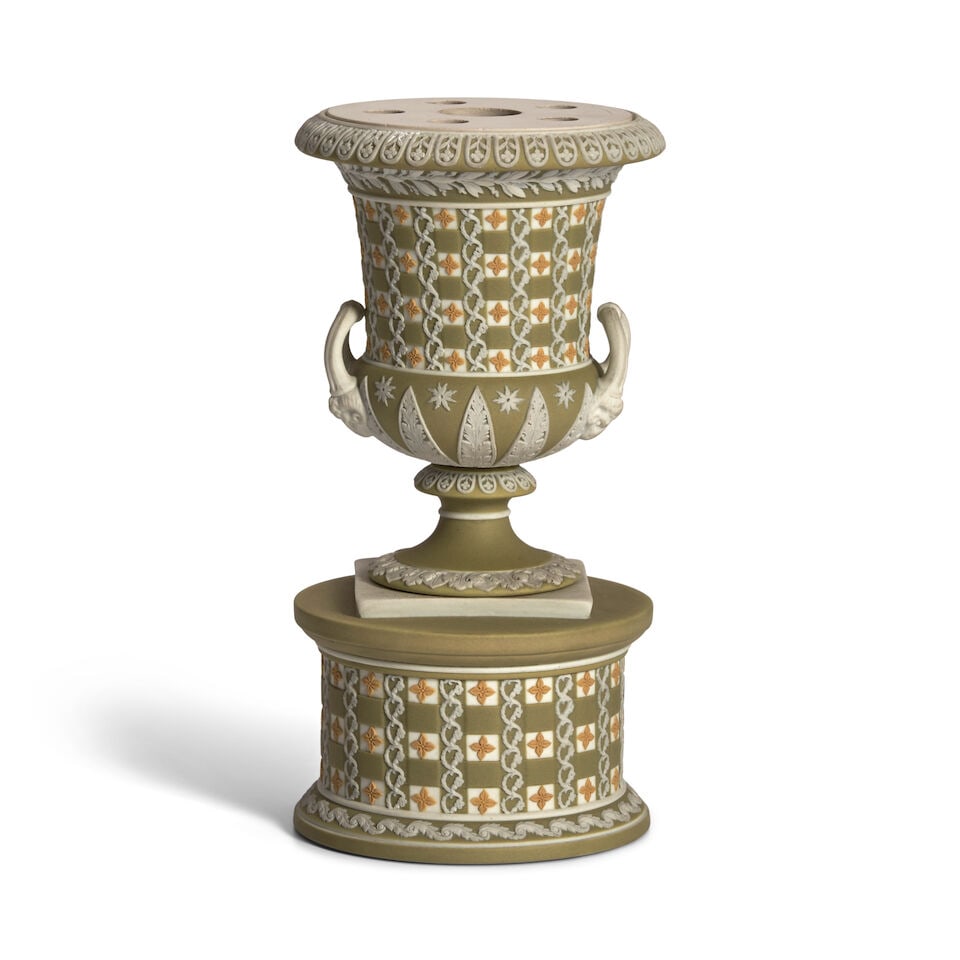 Wedgwood Tricolor Jasper Dip Diceware Urn on Drum Base, England, 19th century,: Wedgwood Tricolor Jasper Dip Diceware Urn on Drum Base, England, 19th century, green ground with yellow quatrefoils to a white body and trim, pierced grid cover, impressed mark, ht. 6 1/2 in. For furt