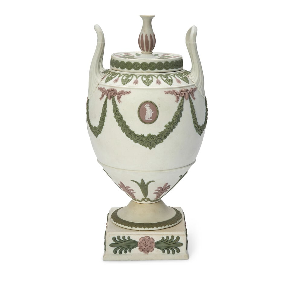 Wedgwood Tricolor Jasper Vase and Cover, England, 19th century,: Wedgwood Tricolor Jasper Vase and Cover, England, 19th century, urn finial and upturned loop handles to an oval body, solid white ground with classical relief in green and lilac, impressed mark, ht. 1