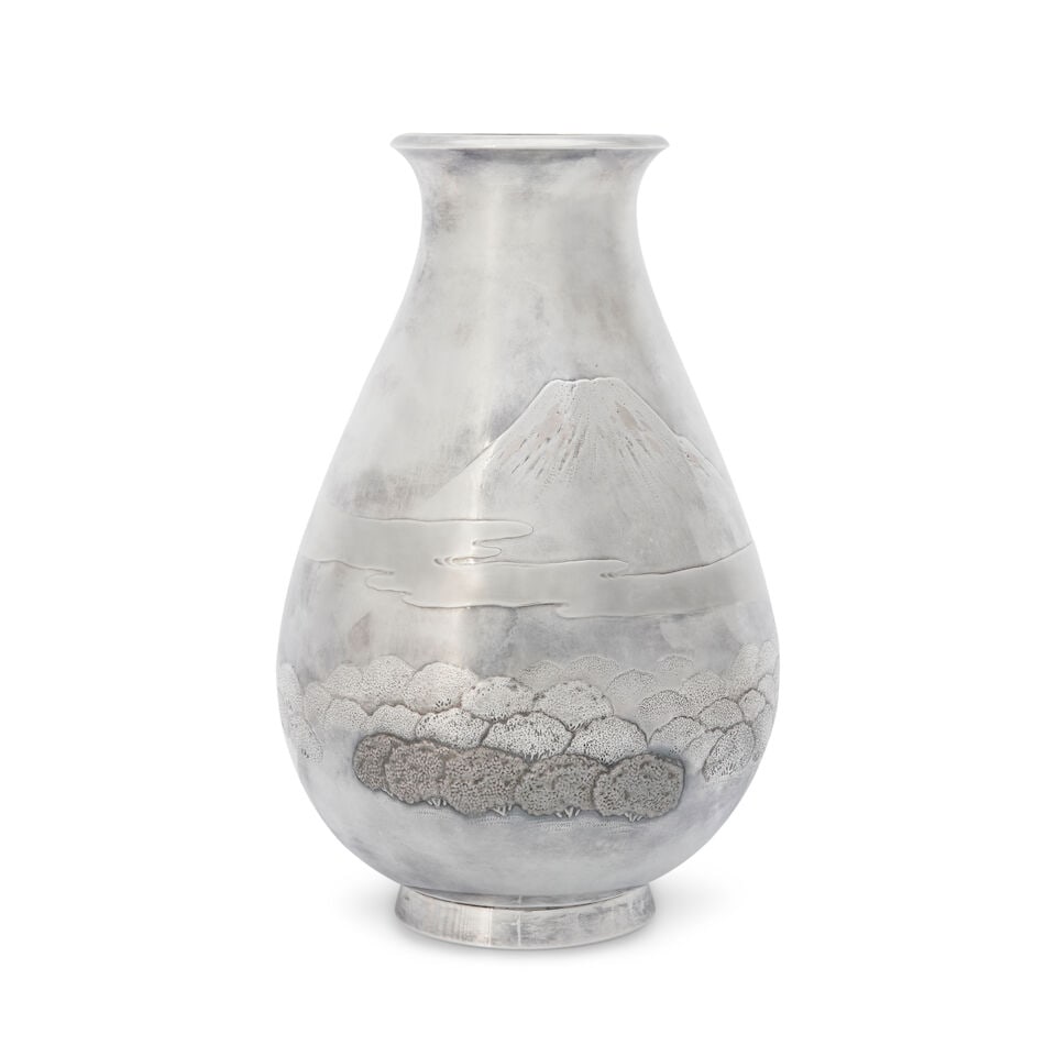 A Japanese Silver Vase,: A Japanese Silver Vase, early 20th century, Mihō, maker, the pear-shaped vase with an everted mouth and set on a slightly splayed foot decorated with a scene of cherry trees in full blossom