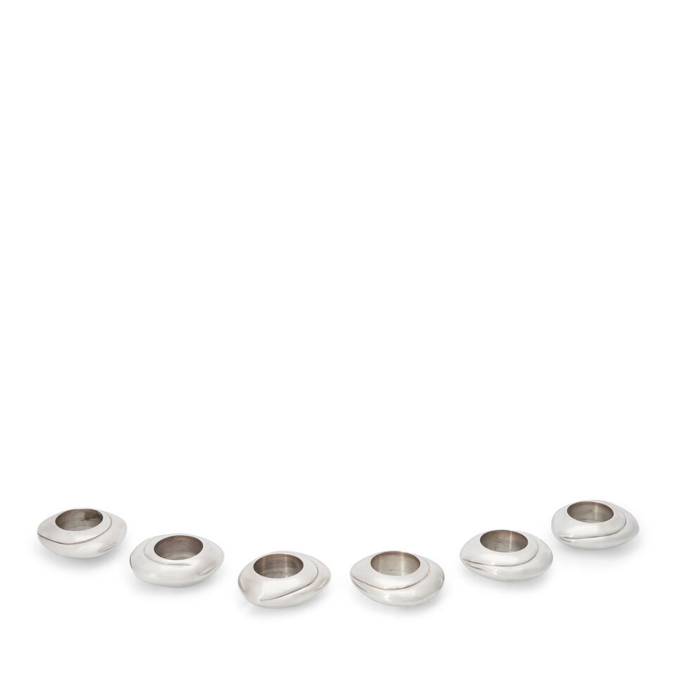 Set of Six Christofle Silverplate Candle Holders,: Set of Six Christofle Silverplate Candle Holders, France, 20th century, in the Modernist style, lg. 3 in. For further information on this lot please visit Bonhams.com For further information