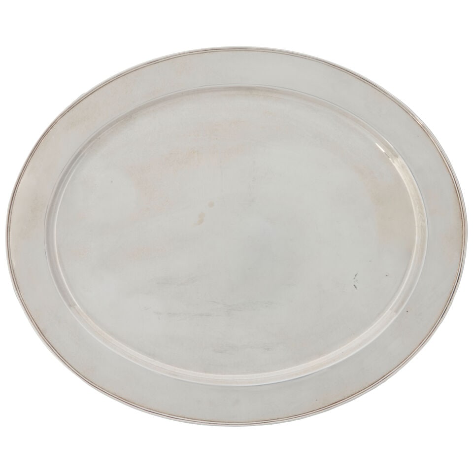 Tiffany & Co. Oval Platter,: Tiffany & Co. Oval Platter, New York, 1907-1938, plain with a delicate rope-twist border, lg. 13 1/2 in., approx. 30.35 troy oz. For further information on this lot please visit Bonhams.com For