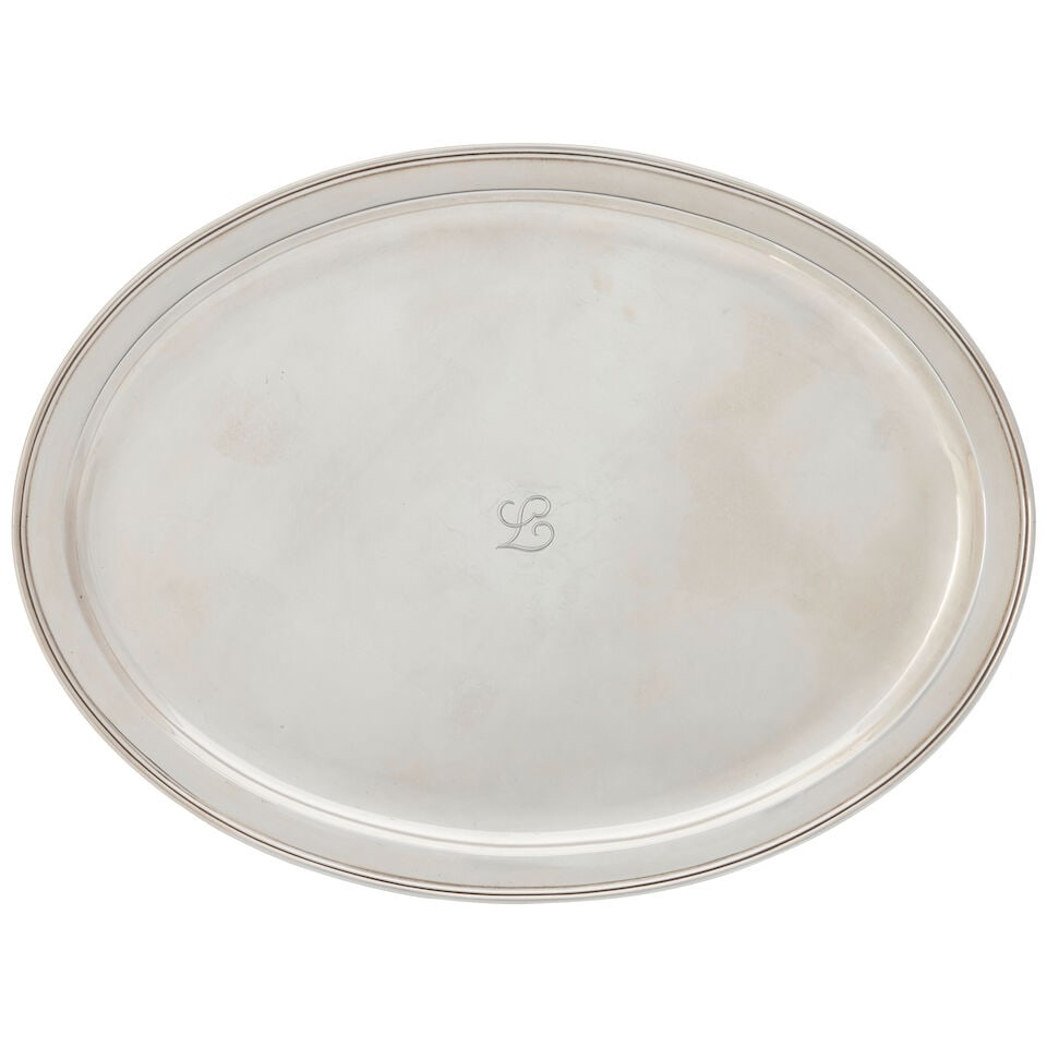 Large Tiffany & Co. Oval Platter,: Large Tiffany & Co. Oval Platter, New York, 1907-1938, plain with a monogram to center, lg. 16 in., approx. 39.05 troy oz. For further information on this lot please visit Bonhams.com For further