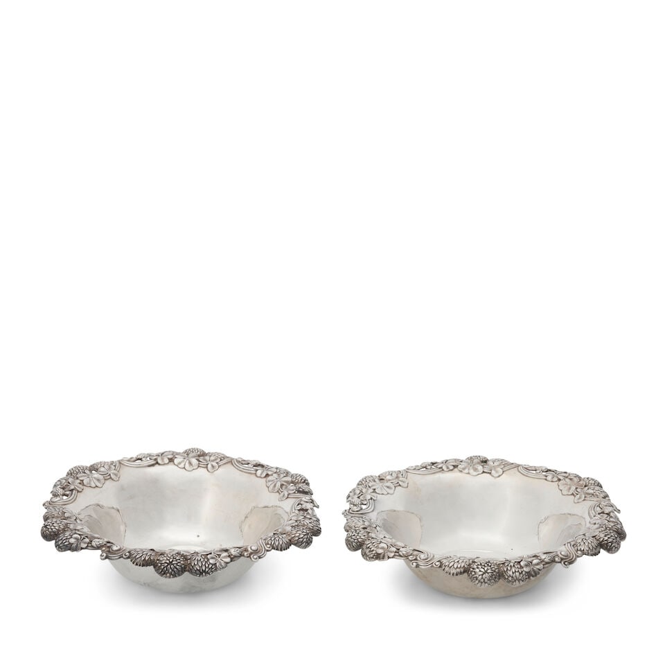 Pair of Tiffany & Co. Sterling Silver Strawberry Bowls,: Pair of Tiffany & Co. Sterling Silver Strawberry Bowls, New York, 1891-1902, the base of the bowl slightly convex, dia. 9 in.; approx. 24.90 troy oz. For further information on this lot please visit