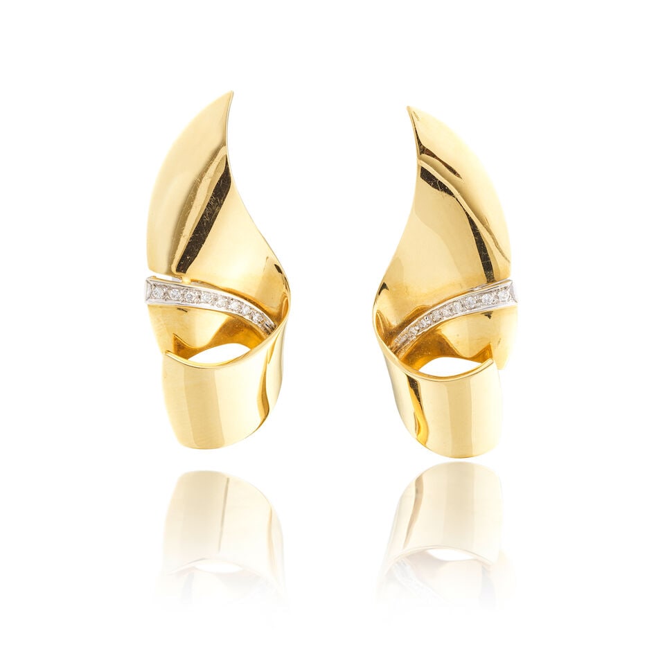 DIAMOND EARRINGS PAIRE DE BOUCLES D'OREILLES DIAMANTS: DIAMOND EARRINGS PAIRE DE BOUCLES D'OREILLES DIAMANTS • French import marks for 18 carat yellow and white gold (750 ‰) • 16 brilliant-cut diamonds weighing approximately 0.32 ct tota