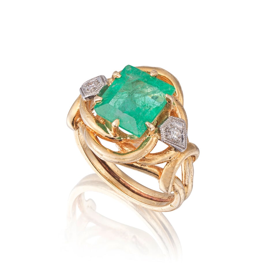EMERALD AND DIAMOND RING BAGUE ÉMERAUDE ET DIAMANTS: EMERALD AND DIAMOND RING BAGUE ÉMERAUDE ET DIAMANTS • French import mark for 14 carat yellow and white gold (585 ‰) • 1 rectangular-shaped emerald weighing approximately 3.15 ct