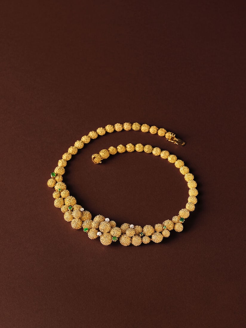 EMERALD AND DIAMOND NECKLACE COLLIER ÉMERAUDES ET DIAMANTS: EMERALD AND DIAMOND NECKLACE COLLIER ÉMERAUDES ET DIAMANTS • French import mark for 9 carat yellow and white gold (375 ‰). The necklace in 18 carat gold (750 ‰) and the claws in