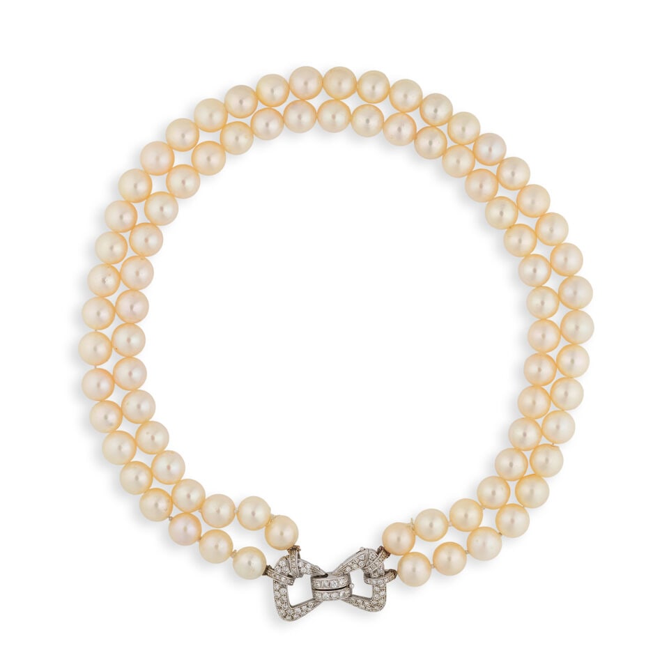 CULTURED PEARL AND DIAMOND NECKLACE COLLIER PERLES DE CULTURE ET DIAMANTS: CULTURED PEARL AND DIAMOND NECKLACE COLLIER PERLES DE CULTURE ET DIAMANTS • French import mark for 18 carat white gold (750 ‰) • 2 rows of cultured pearls • Numerous brilliant-
