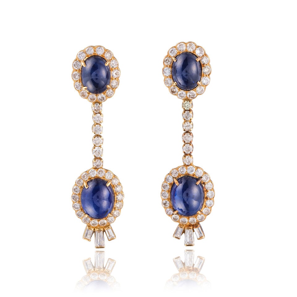 SAPPHIRE AND DIAMOND EARRINGS BOUCLES D'OREILLES SAPHIRS ET DIAMANTS: SAPPHIRE AND DIAMOND EARRINGS BOUCLES D'OREILLES SAPHIRS ET DIAMANTS • French import mark for 18 carat yellow gold (750 ‰) • 4 cabochon sapphires weighing approximately 16 cts total 