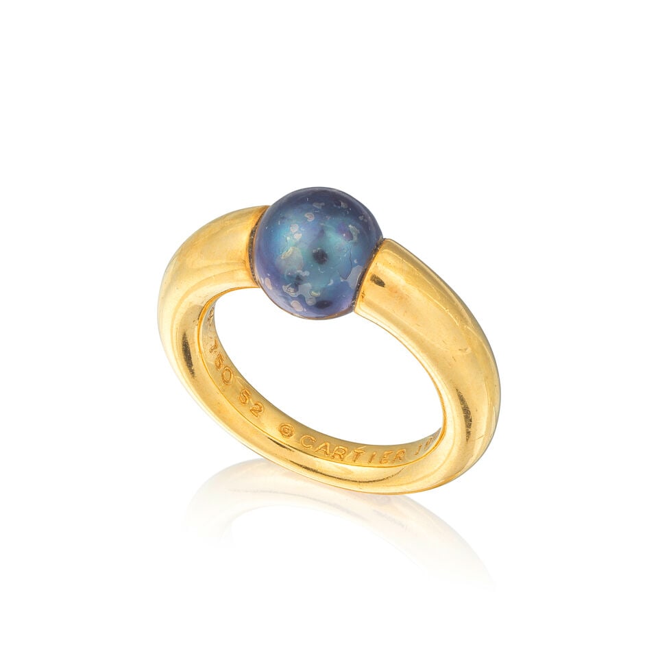 CARTIER: PEARL RING CARTIER: BAGUE PERLE: CARTIER: PEARL RING CARTIER: BAGUE PERLE • French assay mark for 18 carat yellow gold (750 ‰) • Black pearl • Ring size 51 (FR) - L (UK)​ • Gross weight 11.40 grams