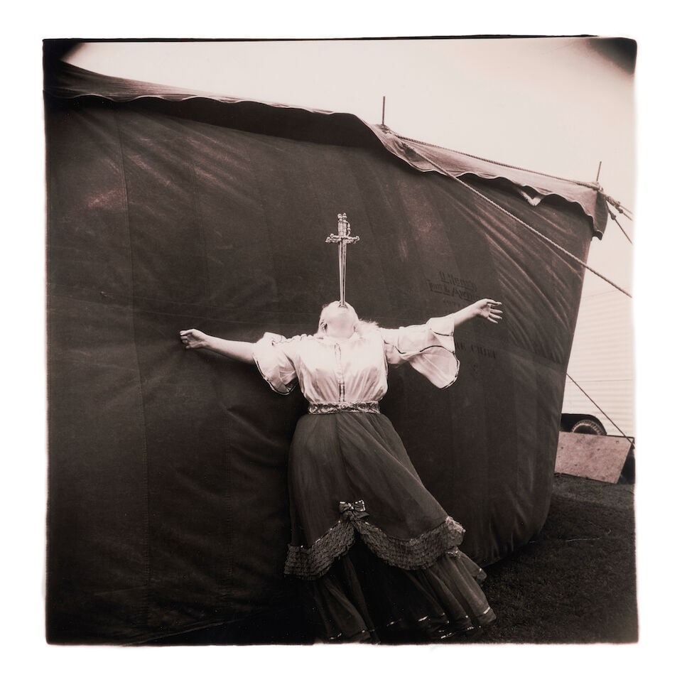 Diane Arbus (1923-1971); Albino sword swallower at a carnival, MD;: Diane Arbus (1923-1971) Albino sword swallower at a carnival, MD, 1970 Gelatin silver print, printed posthumously by Neil Selkirk; the 'A Diane Arbus photograph' stamp, signed by Doon Arbus and with t