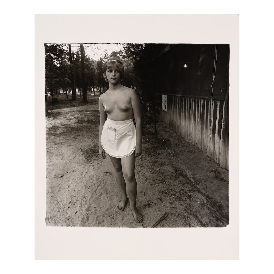 Diane Arbus (1923-1971); A young waitress at a nudist camp, N.J.; - 2