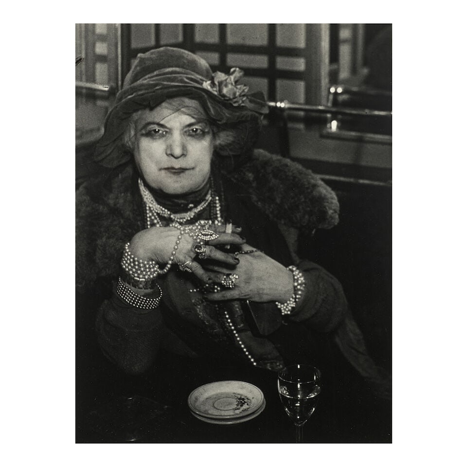 Brassaï (1899-1984); La Môme Bijou, Bar de la Lune, Montmartre;: Brassaï (1899-1984) La Môme Bijou, Bar de la Lune, Montmartre, 1932 Gelatin silver print, printed later; signed and editioned '22/30' in red ink in the margin, dated, annotated, and editione