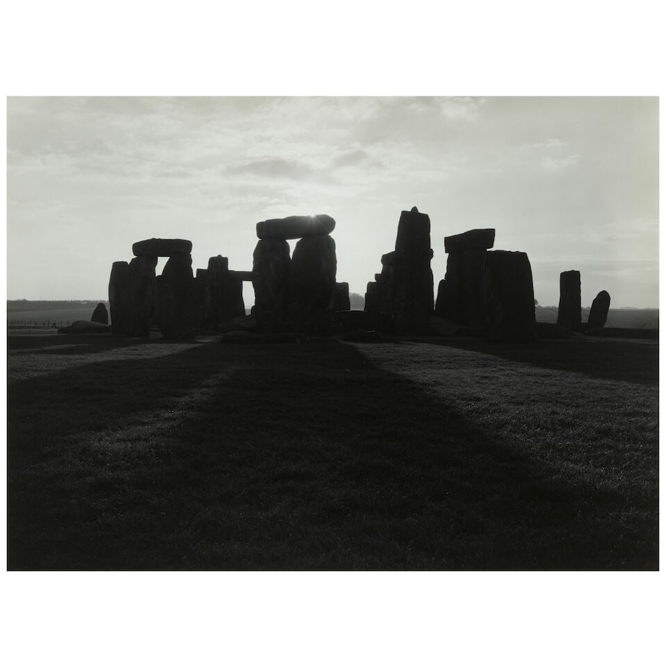 Paul Caponigro (1932-2024); 'Stonehenge, Sunrise';: Paul Caponigro (1932-2024) 'Stonehenge, Sunrise', c. 1970 Gelatin silver print, printed later; mounted, signed in pencil on the mount, signed and titled in pencil on the reverse, framed. 14 1/8 x 19 1