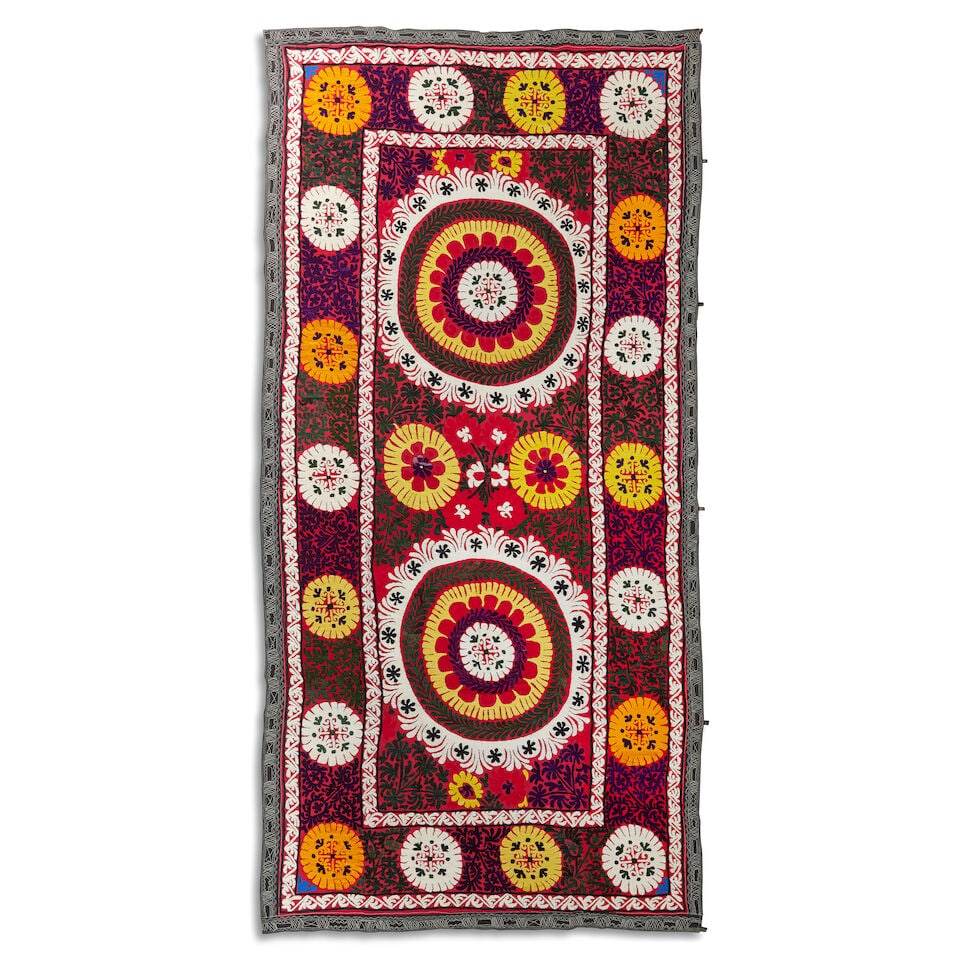 An embroidered wool panel (suzani) Central Asia, second half of 20th Century (1 of 3)