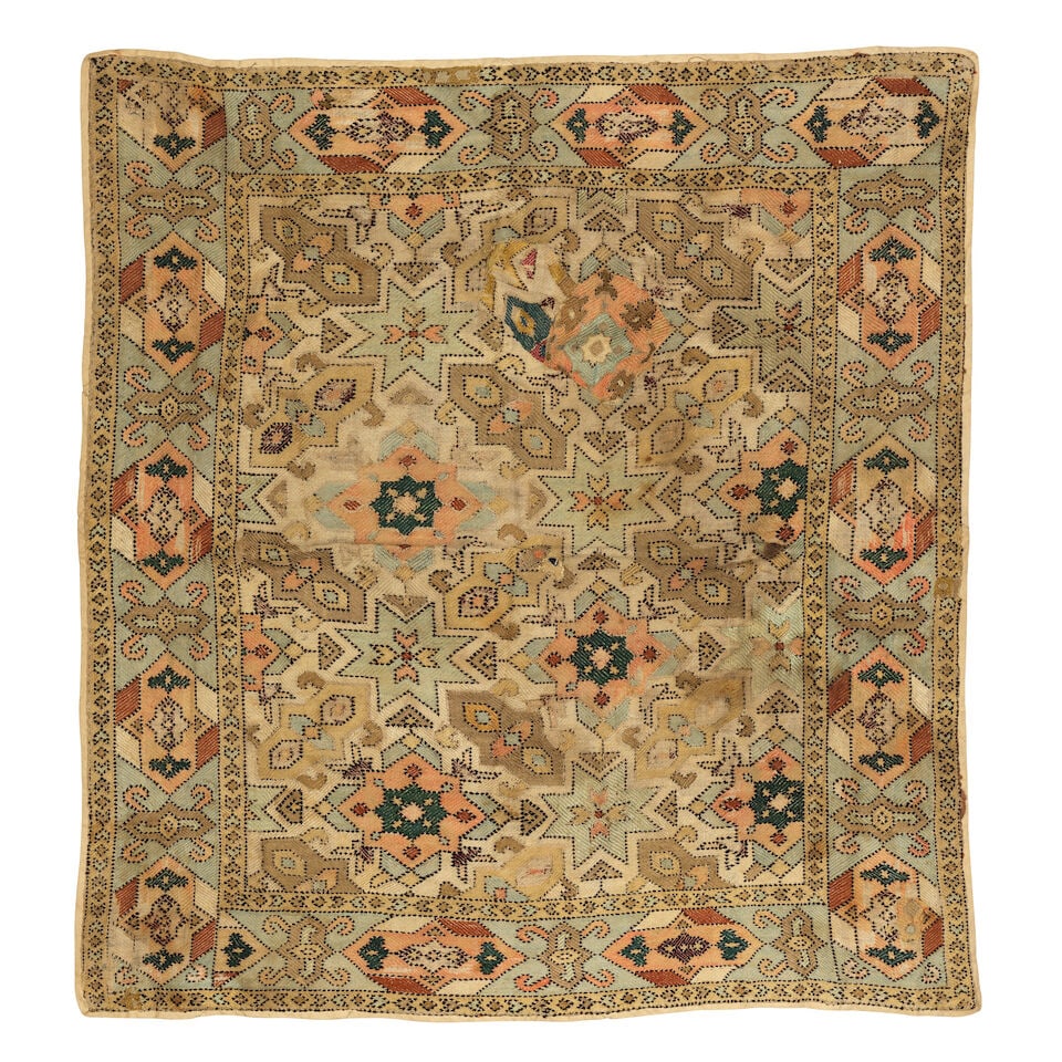 A silk embroidered linen panel Caucasus, probably Azerbaijan, late 18th Century (1 of 2)