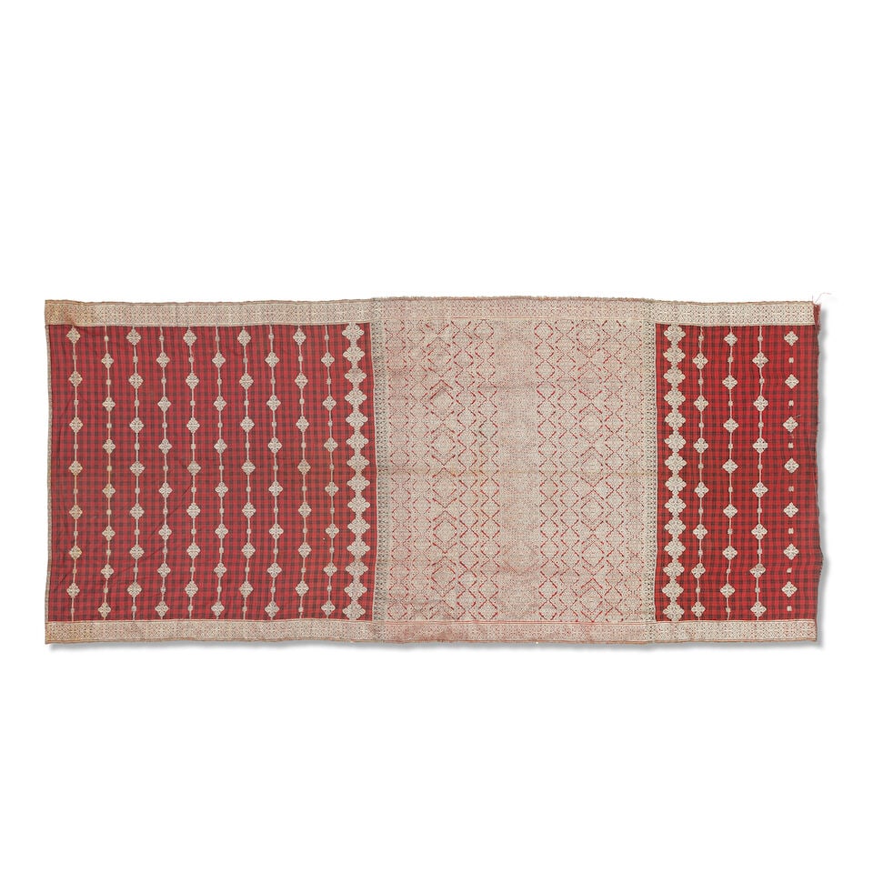 A Sumatra shoulder cloth Lat 19th/early 20th (2): A Sumatra shoulder cloth Lat 19th/early 20th selendang, silk with gold thread, circa 1880, together with a Sumbawa silk sarong, silk with gold thread, circa 1900, the longest example 191cm x 81cm