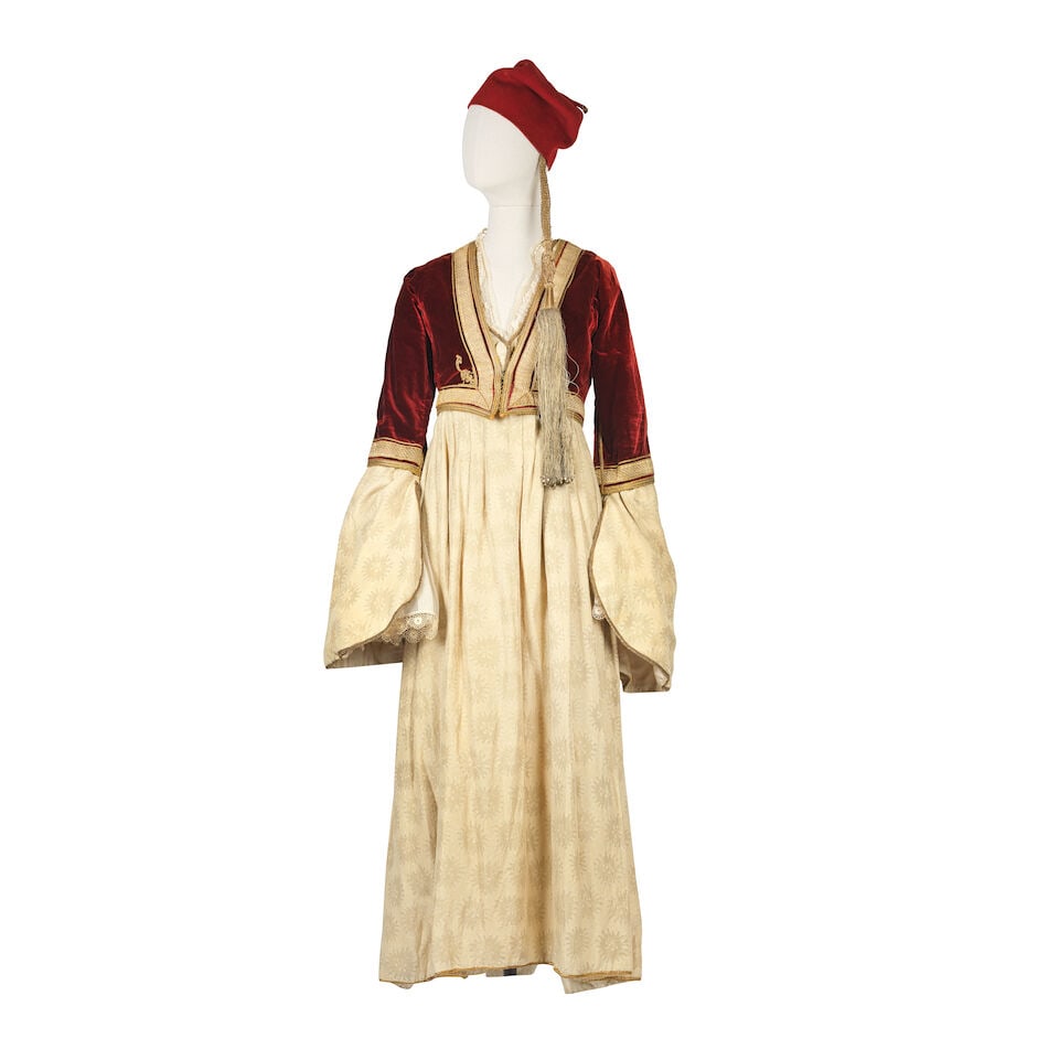 A gilt-thread embroidered velvet Queen Amalia dress, jacket and two hats Greece, early 20th Cent... (1 of 4)