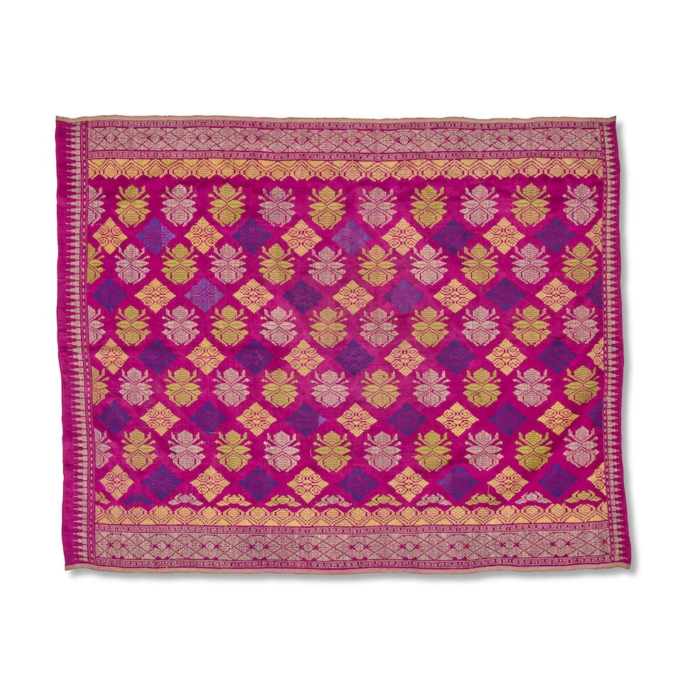 A collection of three Bali silk cloths Before 1920: A collection of three Bali silk cloths Before 1920 The longest on cherry red ground, with label, the smaller cloth with recurring star motifs, the smallest cloth on plum ground, (3) the longest exampl