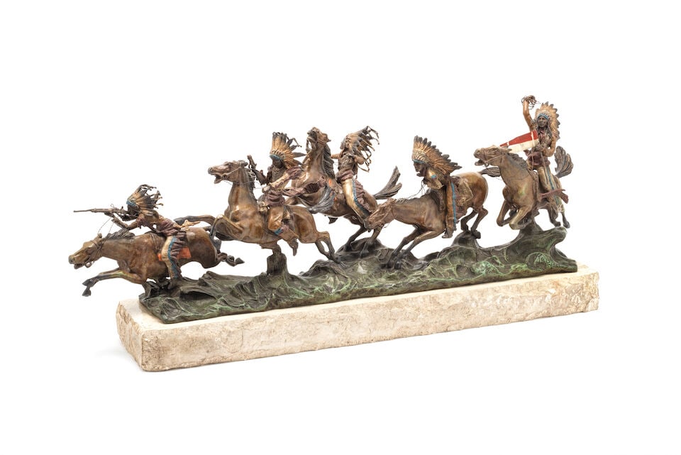 After Carl Kauba (Austrian, 1865-1922): A cold painted bronze equestrian model of five Native Am... (1 of 1)