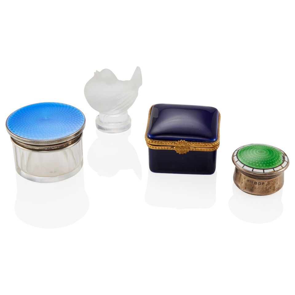 GROUP OF THREE BOXES INCLUDING LIMOGES FOR TIFFANY & CO. AND A LALIQUE BIRD: GROUP OF THREE BOXES INCLUDING LIMOGES FOR TIFFANY & CO. AND A LALIQUE BIRD • One porcelain hinged box, signed Limoges for Tiffany & Co., measures 1 11/16 x 1 11/16 x 1 1/4 in. • One glass