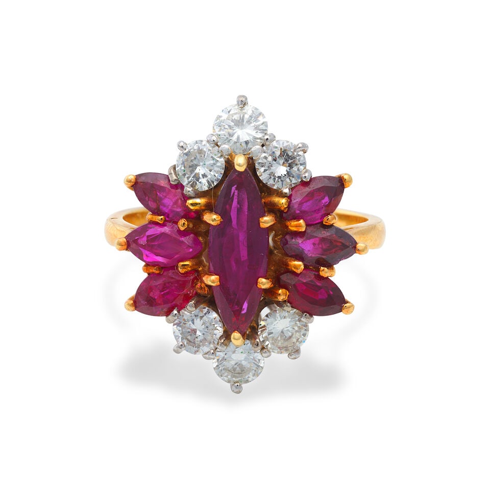 RUBY AND DIAMOND RING,: RUBY AND DIAMOND RING, 2004 Marquise-shaped rubies Brilliant-cut diamonds approx. 0.35ct total 18 carat gold London hallmark Ring size approx. L 1/2 Weight approx. 5.5g Footnotes: OVERALL CONDITION L