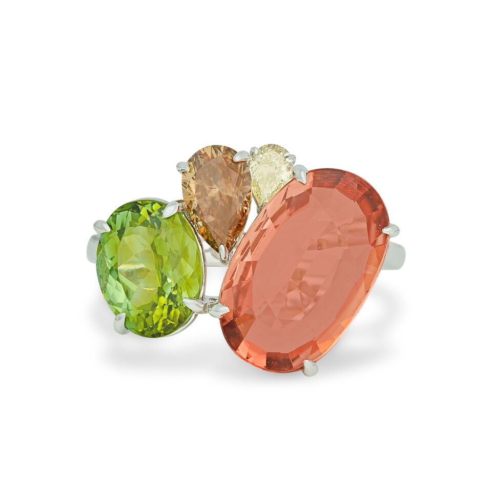 TOURMALINE AND DIAMOND RING: TOURMALINE AND DIAMOND RING Oval-shaped vari-coloured tourmalines Pear-shaped diamond and coloured diamond approx. 0.70ct total (untested for colour origin and treatment) 18 carat gold UK