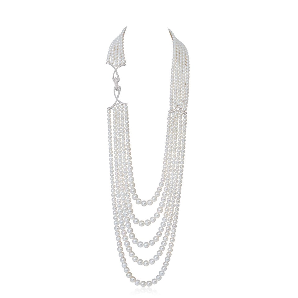 CULTURED PEARL NECKLACE WITH DIAMOND-SET CLASP: CULTURED PEARL NECKLACE WITH DIAMOND-SET CLASP 6.5-10.5mm graduated cultured pearls Single-cut diamonds, approx. 1.50cts total Length approx. 70.0cm Weight approx. 380.0g Footnotes: OVERALL