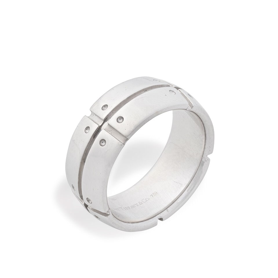 TIFFANY: 'STREAMERICA' RING: TIFFANY: 'STREAMERICA' RING Signed Tiffany & Co. Ring size approx. L Weight approx. 11.0g Footnotes: OVERALL CONDITION Unhallmarked metal with negligible surface wear. Signed TIFFANY & Co., 2002,