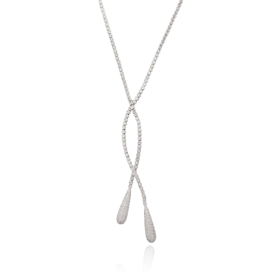 DIAMOND NECKLACE: DIAMOND NECKLACE Brilliant-cut diamonds approx. 3.30cts total Inner length 44.0cm Weight approx. 22.0g Footnotes: OVERALL CONDITION Light surface wear to metal stamped with 14K. DIAMONDS Bright and li