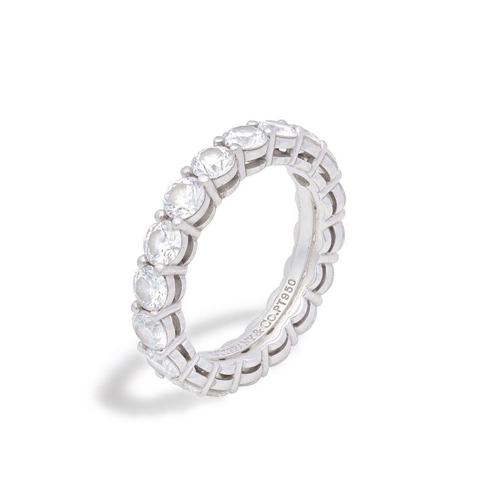 TIFFANY: DIAMOND ETERNITY RING: TIFFANY: DIAMOND ETERNITY RING Brilliant-cut diamonds, approx. 2.70cts total Signed Tiffany & Co. Ring size approx. K Weight approx. 5.5g Maker's case Footnotes: OVERALL CONDITION Light surface wear t