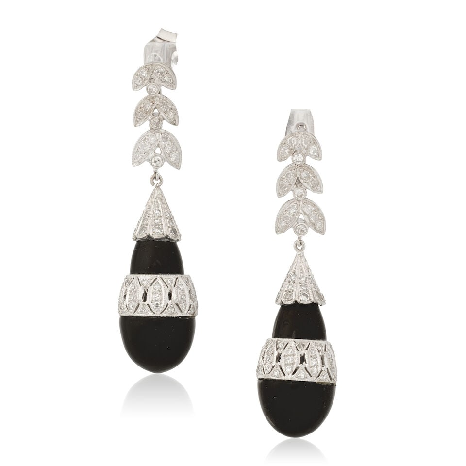 ONYX AND DIAMOND PENDENT EARRINGS: ONYX AND DIAMOND PENDENT EARRINGS Carved onyx Single-cut diamonds, approx. 1.10cts total Length 5.0cm Weight approx. 17.0g Footnotes: OVERALL CONDITION Light surface wear to unhallmarked metal