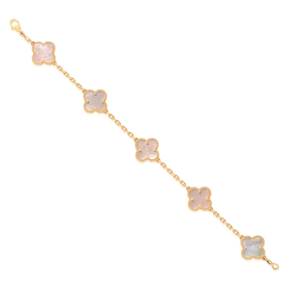 VAN CLEEF & ARPELS: 'ALHAMBRA' MOTHER-OF-PEARL BRACELET: VAN CLEEF & ARPELS: 'ALHAMBRA' MOTHER-OF-PEARL BRACELET Mother-of-pearl 18 carat gold Signed VCA, maker's mark, numbered JD465525, French assay mark, Swiss assay mark, European convention mark Length