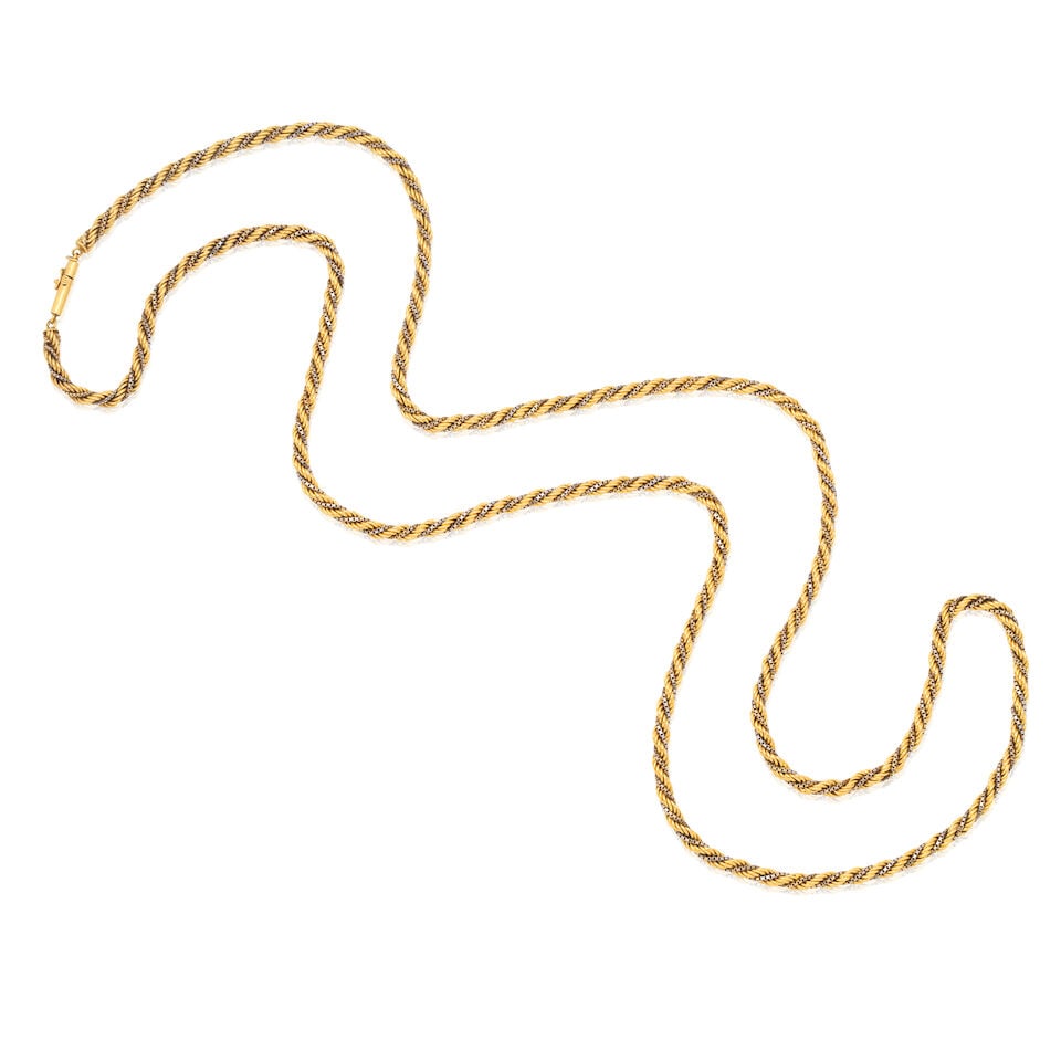 LONGCHAIN, 1979: LONGCHAIN, 1979 Of ropetwist linking 18 carat gold London hallmark Length 118.0cm Weight approx. 68.0g Footnotes: OVERALL CONDITION Light surface wear to metal testing as 18kt gold. Link near clasp m