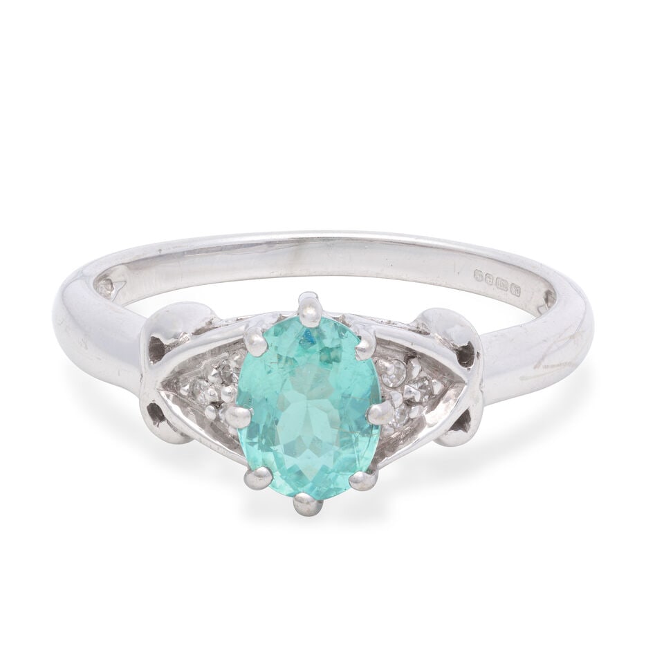 PARAIBA-TYPE TOURMALINE AND DIAMOND RING, 2008: PARAIBA-TYPE TOURMALINE AND DIAMOND RING, 2008 Oval-cut paraiba-type tourmaline weighing approx. 0.74ct Single-cut diamonds 18 carat gold UK hallmark Ring size approx. N Weight approx. 3.5g Footnotes:
