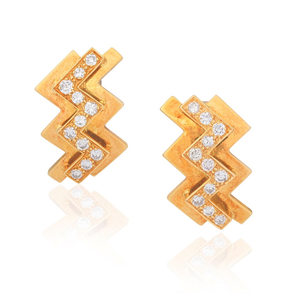 DIAMOND-SET EARCLIPS: DIAMOND-SET EARCLIPS Brilliant-cut diamonds, approx. 0.80ct total 18 carat gold London hallmark Length 2.4cm Total weight approx. 12.0g Footnotes: OVERALL CONDITION Light surface wear to 18 carat gold