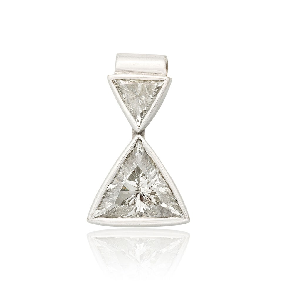 DIAMOND PENDANT: DIAMOND PENDANT Triangular-cut diamonds approx. 2.10cts total Length 2.0cm Weight approx. 3.0g Footnotes: OVERALL CONDITION Unhallmarked metal with light surface wear, testing as 17kt gold.