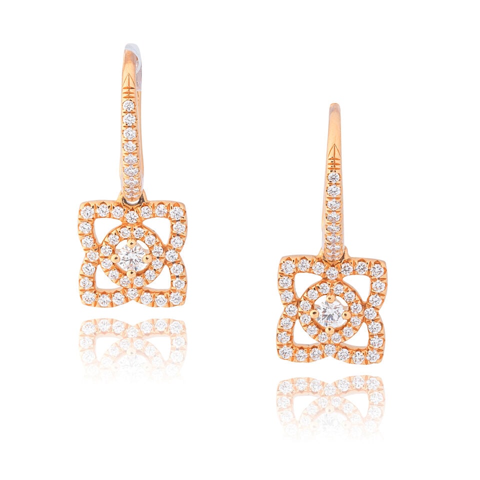 DE BEERS: DIAMOND 'ENCHANTED LOTUS SLEEPER' EARRINGS: DE BEERS: DIAMOND 'ENCHANTED LOTUS SLEEPER' EARRINGS Brilliant-cut diamonds, 0.36ct total 18 carat gold Signed DeBeers, maker's mark, London hallmark, European convention mark Length approx. 2.2cm Wei