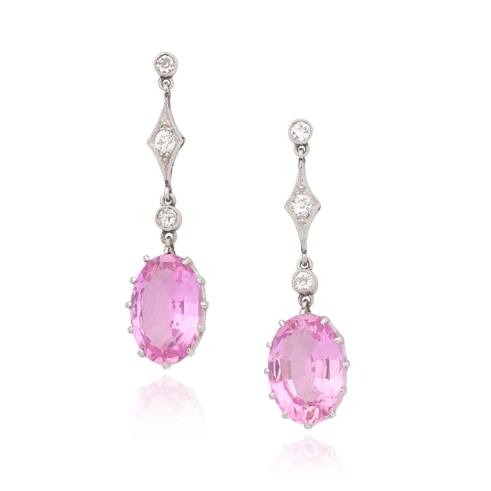 TOPAZ AND DIAMOND EARRINGS, CIRCA 1915: TOPAZ AND DIAMOND EARRINGS, CIRCA 1915 Oval-cut pink topaz Old brilliant-cut diamonds Length approx. 3.0cm Weight approx. 3.5g Cased by S.J. Phillips Footnotes: OVERALL CONDITION Some surface wear co