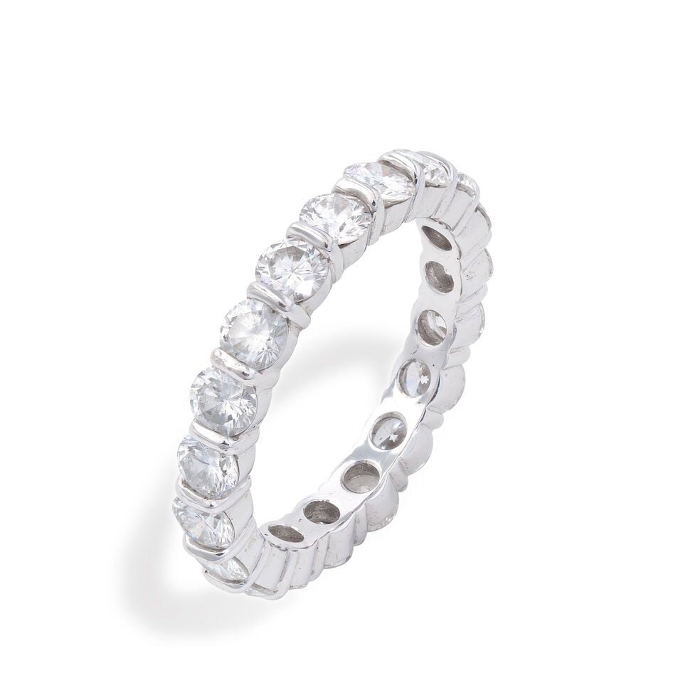 KUTCHINSKY: DIAMOND ETERNITY RING: KUTCHINSKY: DIAMOND ETERNITY RING Brilliant-cut diamonds, approx. 2.25cts Unsigned Ring size approx. L½ Weight approx. 3.5g Maker's case Footnotes: Accompanied by a redacted invoice from