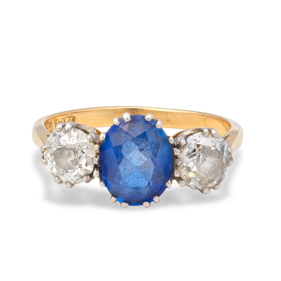 SAPPHIRE AND DIAMOND RING: SAPPHIRE AND DIAMOND RING Oval-cut sapphire Old brilliant-cut diamonds, approx. 1.00ct total Ring size approx. Q½ Weight approx. 4.0g Footnotes: OVERALL CONDITION Light surface wear to unhallmark