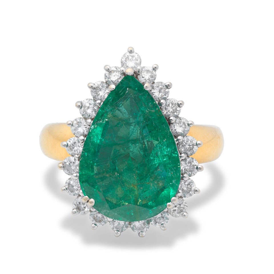 EMERALD AND DIAMOND RING: EMERALD AND DIAMOND RING Pear-shaped emerald Brilliant-cut diamonds approx. 0.80ct total 18 carat gold London hallmark Ring size approx. M Weight approx. 8.0g Footnotes: OVERALL CONDITION Light surfac