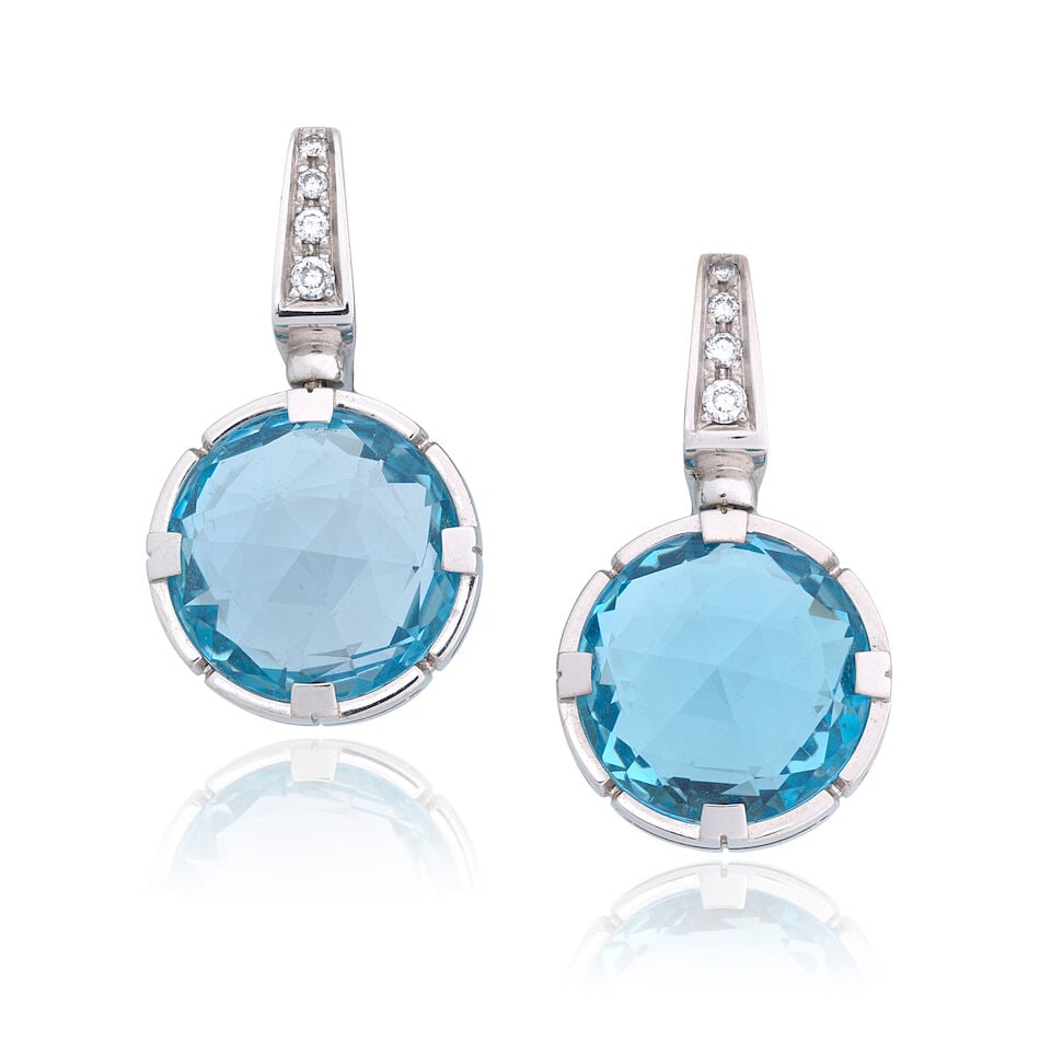 BULGARI: 'PARENTESI' TOPAZ AND DIAMOND EARRINGS: BULGARI: 'PARENTESI' TOPAZ AND DIAMOND EARRINGS Fancy-cut blue topaz Brilliant-cut diamonds 18 carat white gold Signed Bulgari, UK hallmark, European convention mark Length 3.0cm Weight approx.
